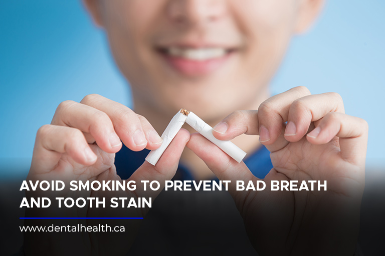 Avoid smoking to prevent bad breath and tooth stain